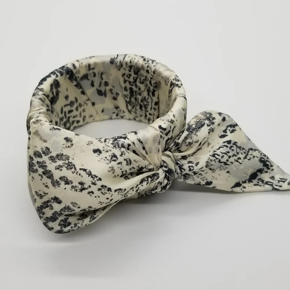 fabric wrapped hinged bangle with bow